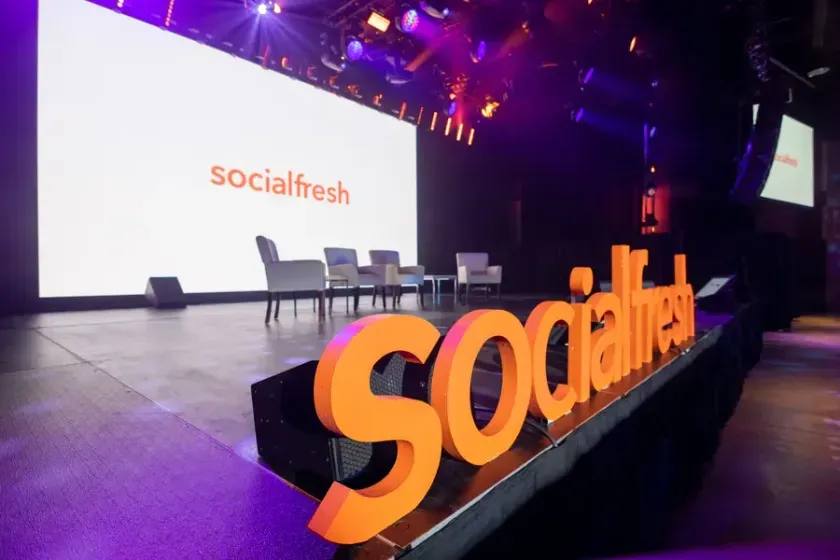 The stage set with the Social Fresh logo on screen, 2019